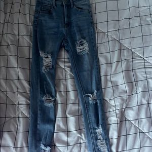 Wax jean light wash with holes size 0 low rise